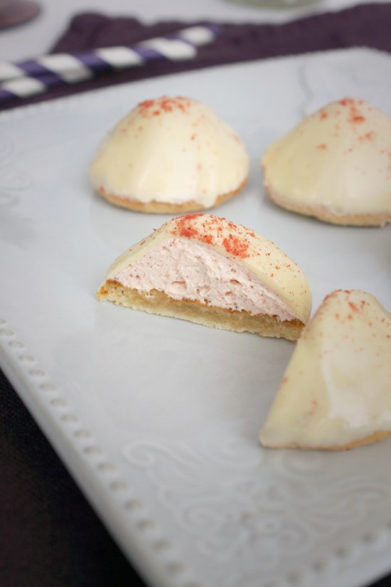 Jordgubbsbiskvier - A Swedish pastry with an almond base, strawberry buttercream, dipped in white chocolate and topped with a strawberry powder